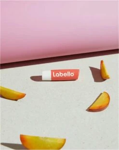 Labello Fruity Shine Peach Lippenbalsem - 5.5ml -Cosmeticawinkel 959x1200 1
